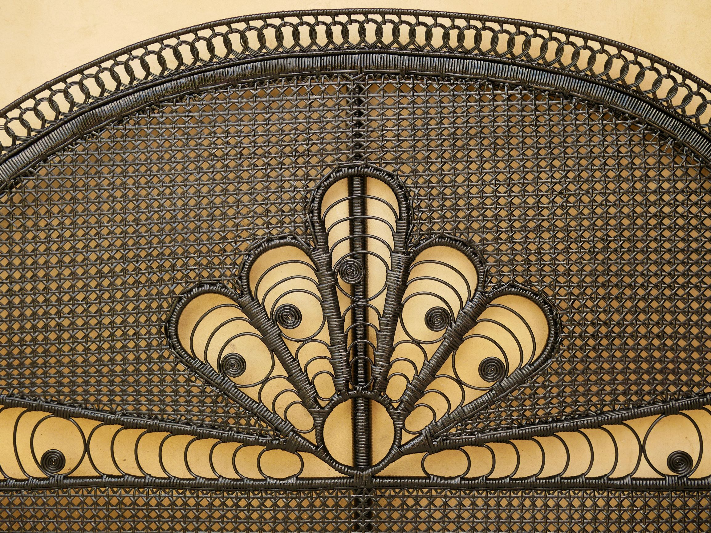 Vintage headboard in black rattan