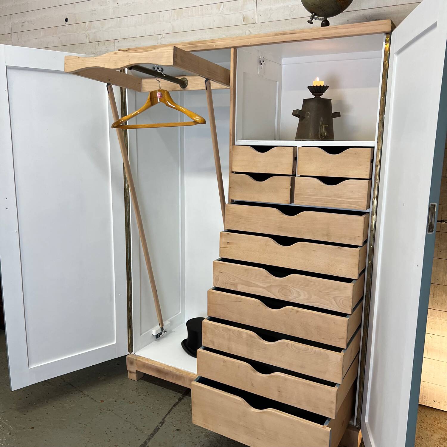 Wardrobe with two wardrobe compartments and drawers