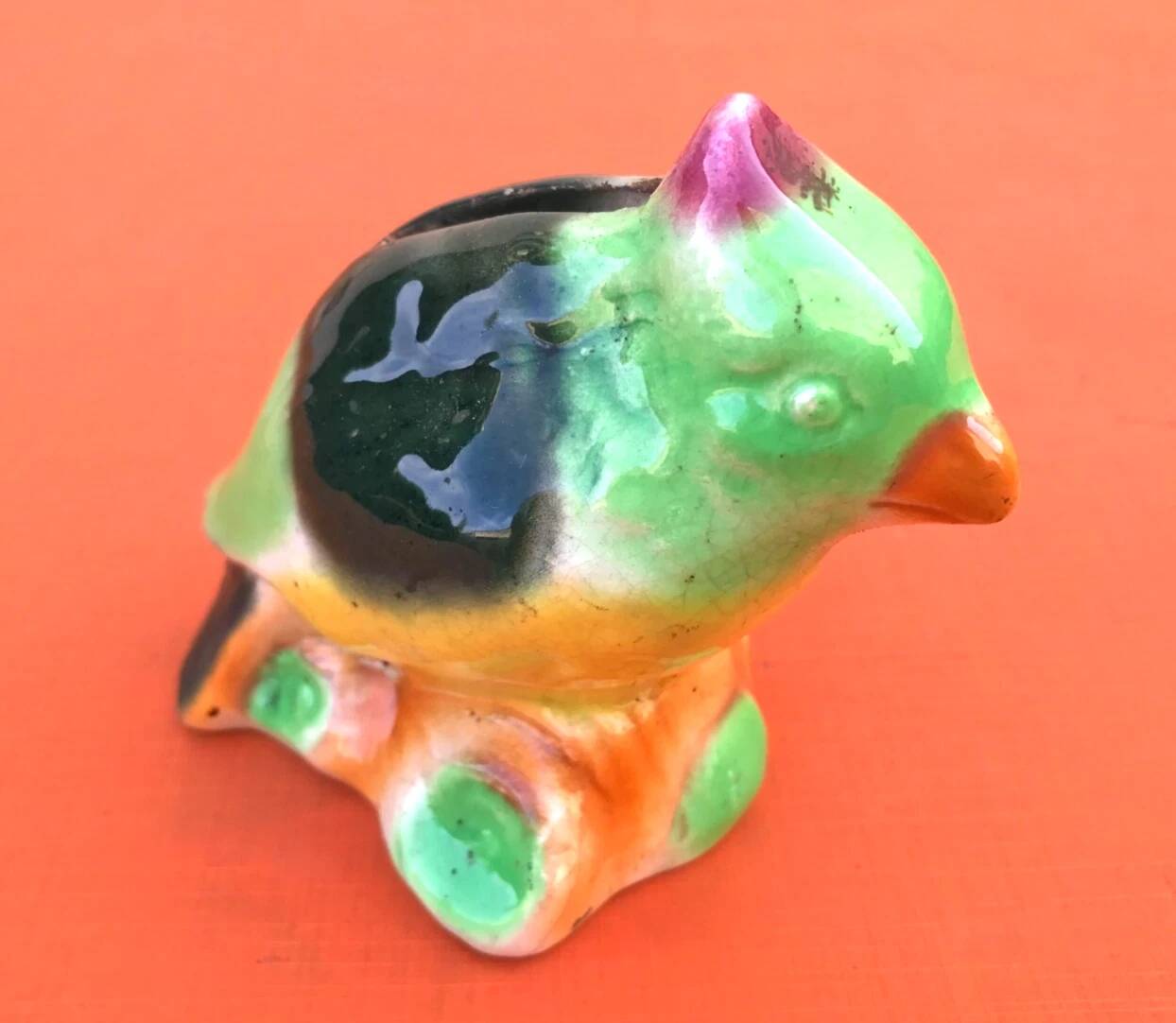Polychrome ceramic parrot shape
