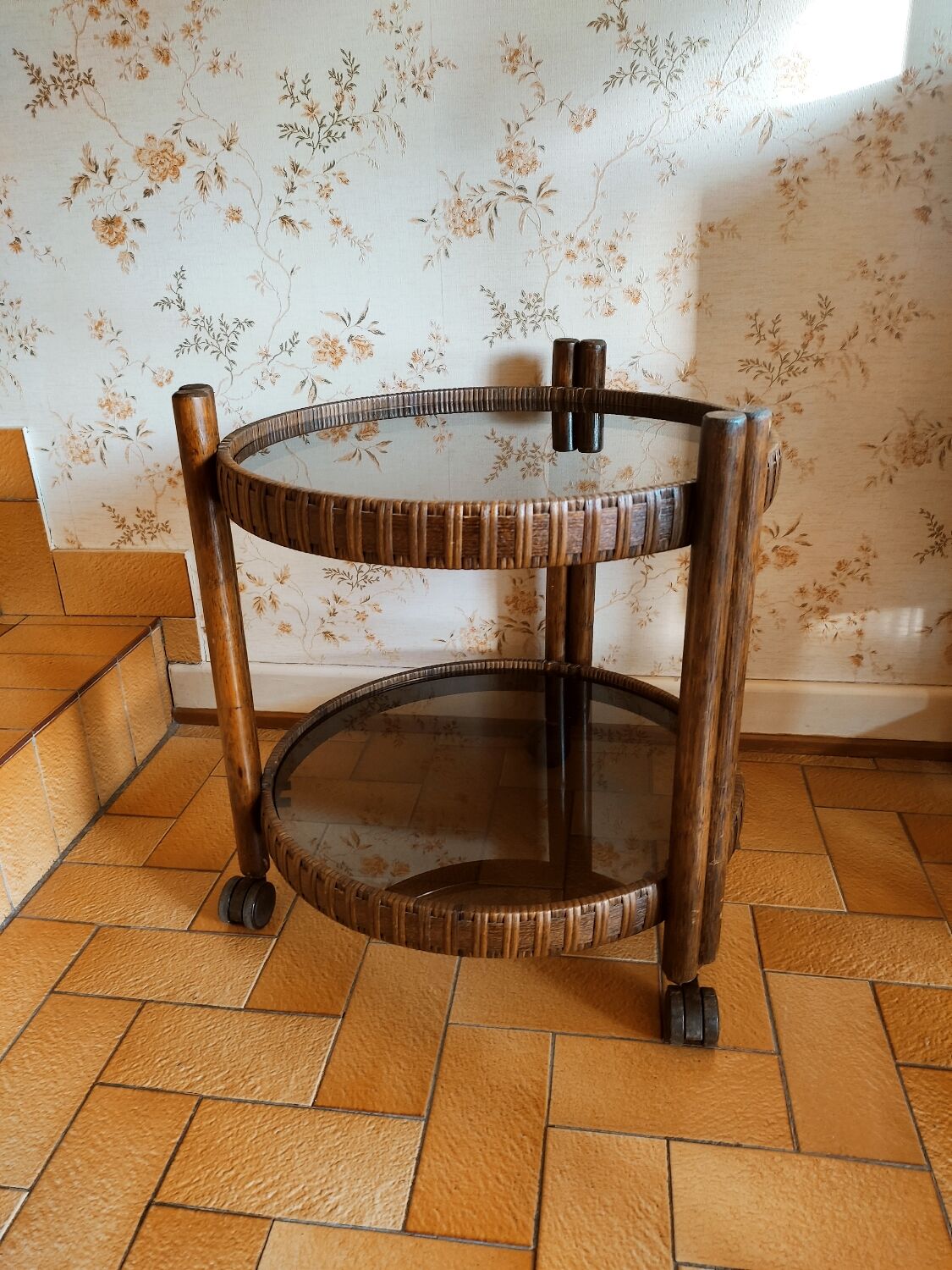 Round rattan bar table on wheels