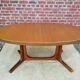 Baumann expandable oval table, 1960