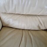 Fauteuil avec pouf en cuir et daim