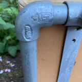 Vintage Italian industrial bench in leather and metal.