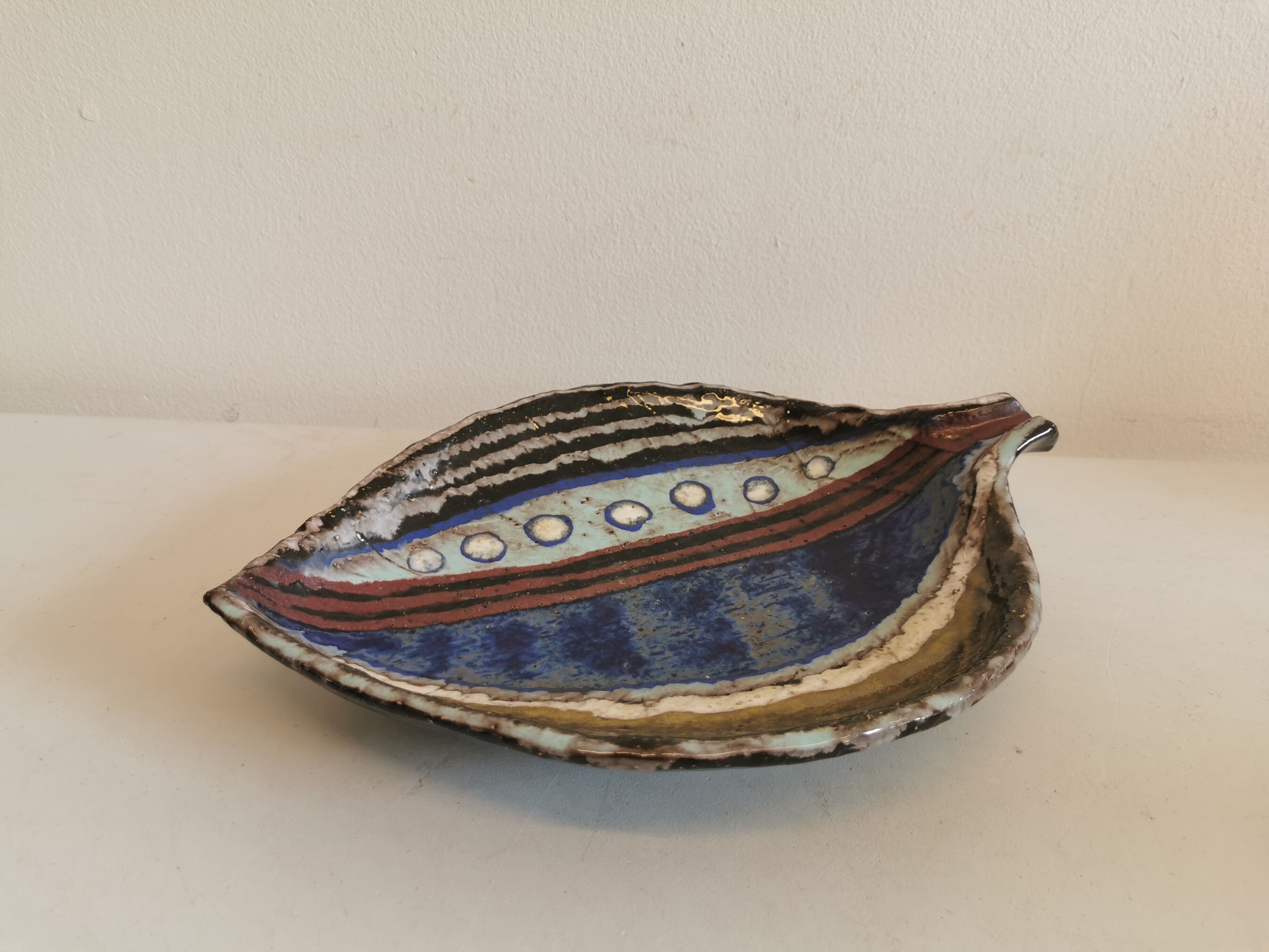 Danish ceramic dish shaped like a leaf.