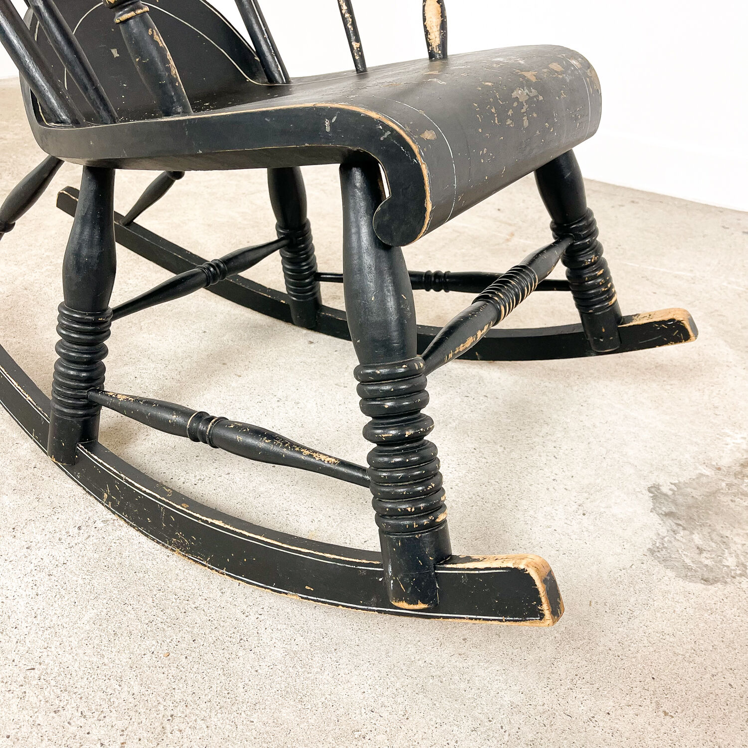 Swedish antique black painted rocking chair