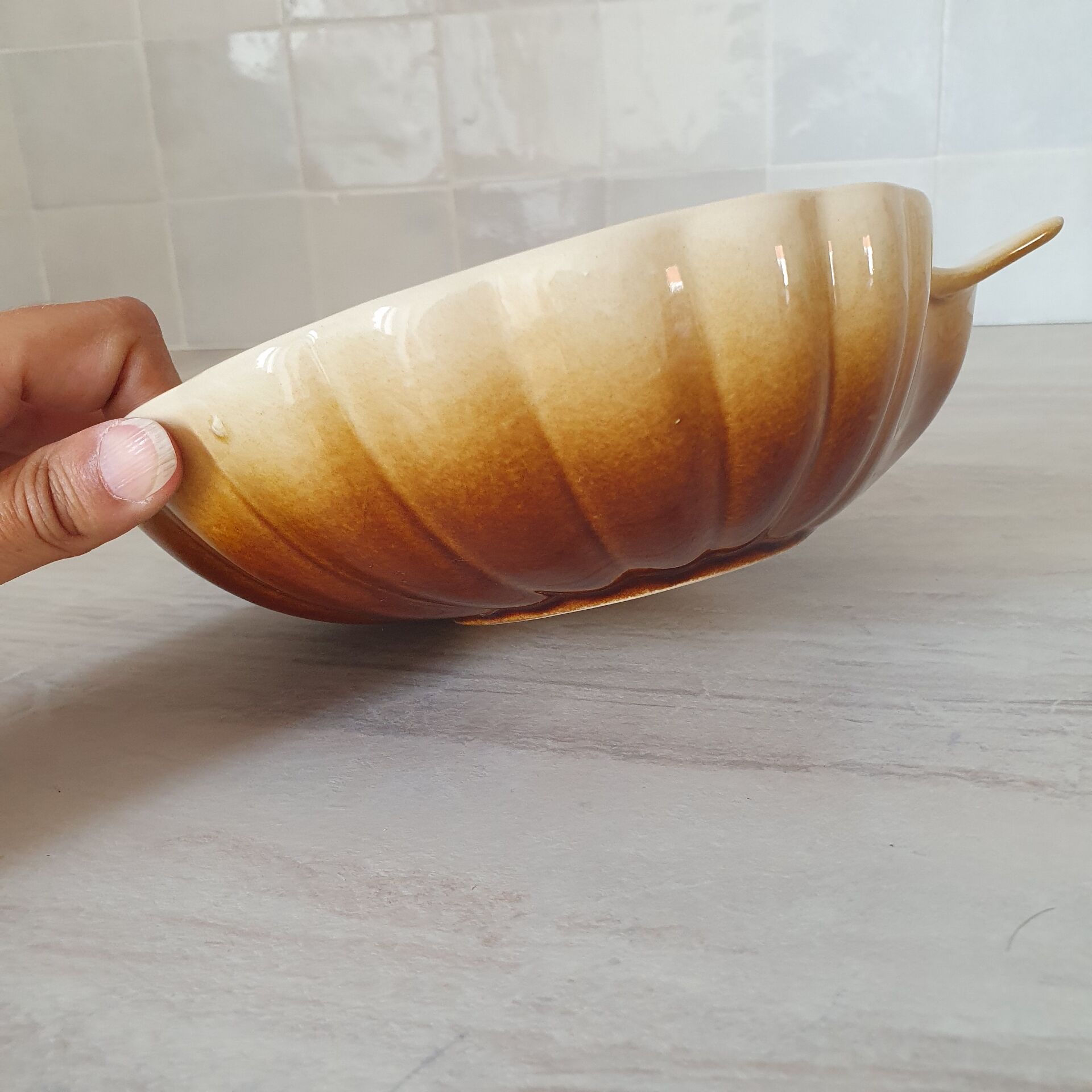 Brown and white ceramic shell bowl