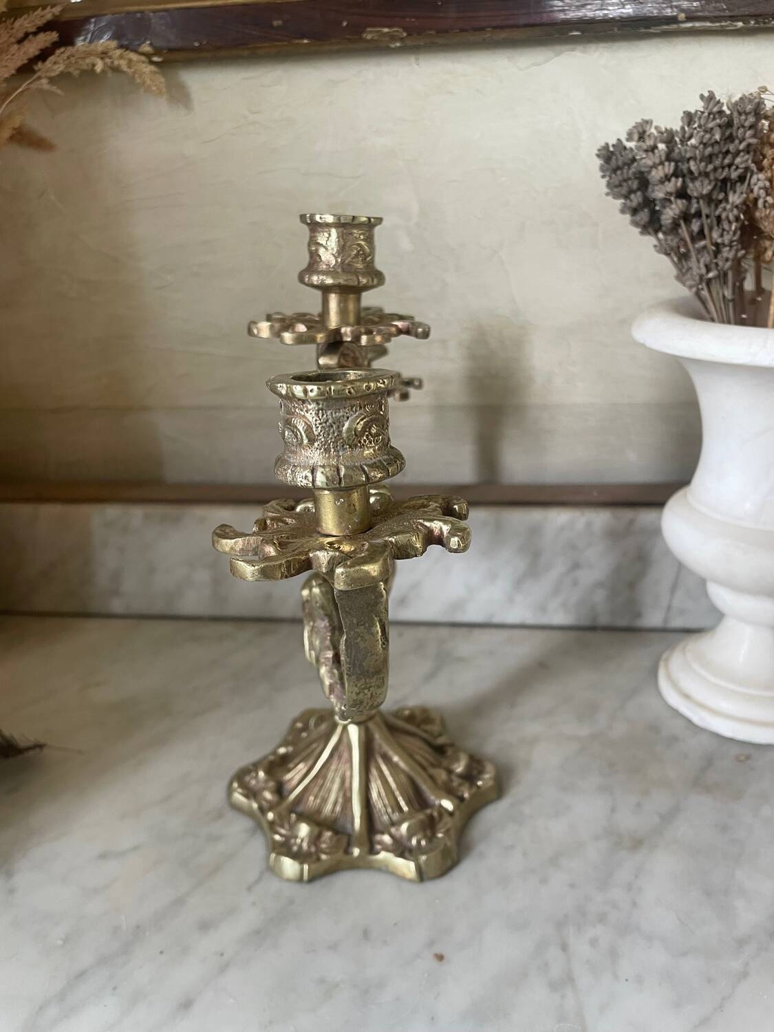 Old gilded bronze candlestick