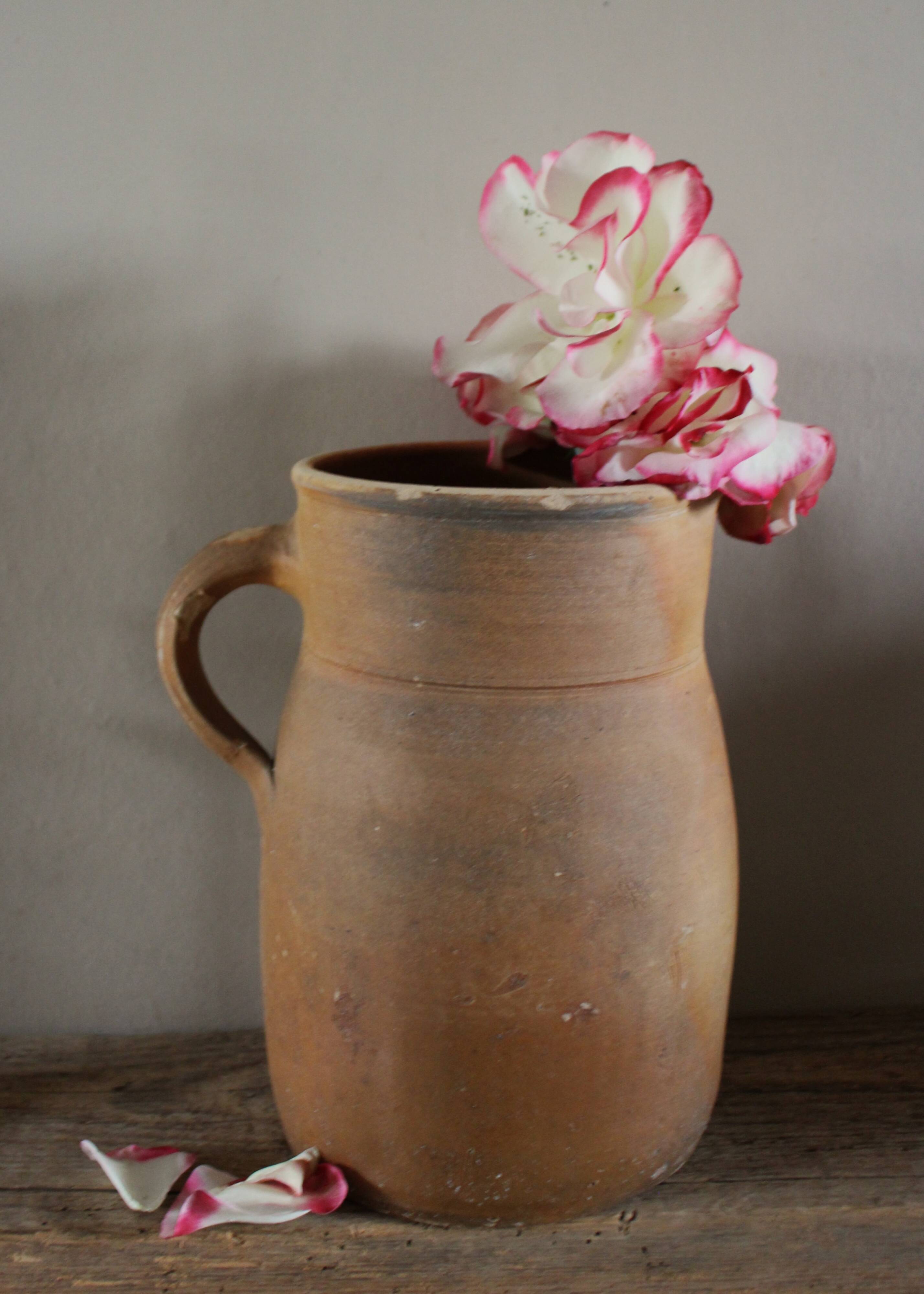 Vintage artisanal terracotta jug
