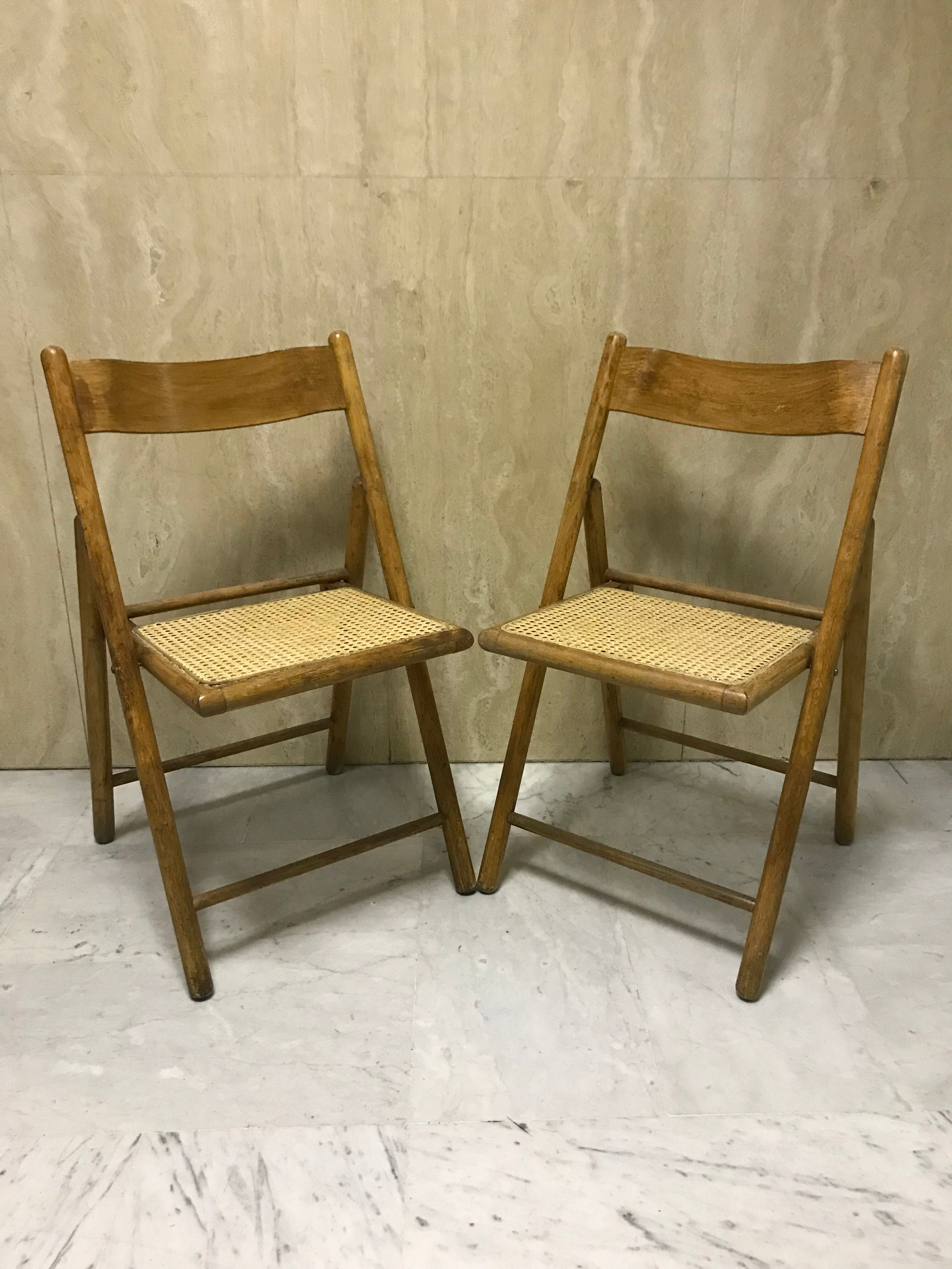 Duo of canned folding chairs