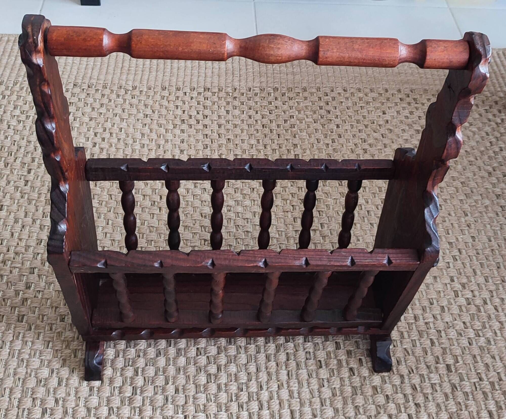 Rustic stained wooden magazine rack