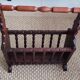 Rustic stained wooden magazine rack