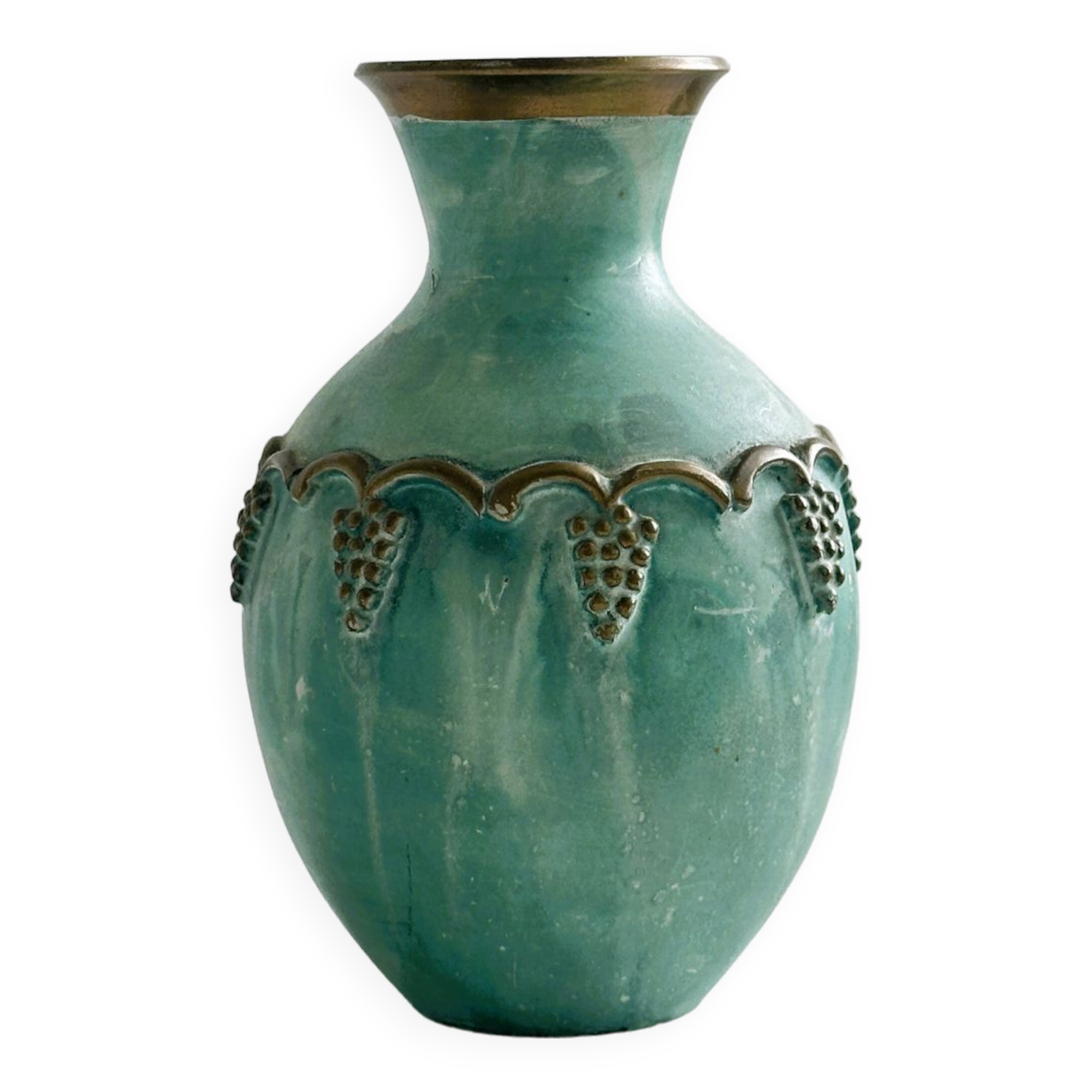 Brass vase decorated with bunches of grapes.
