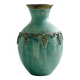 Brass vase decorated with bunches of grapes.