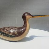Carved painted wooden curlew