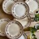 Set of 8 old flat plates in iron earth, decorations of HBC swallows