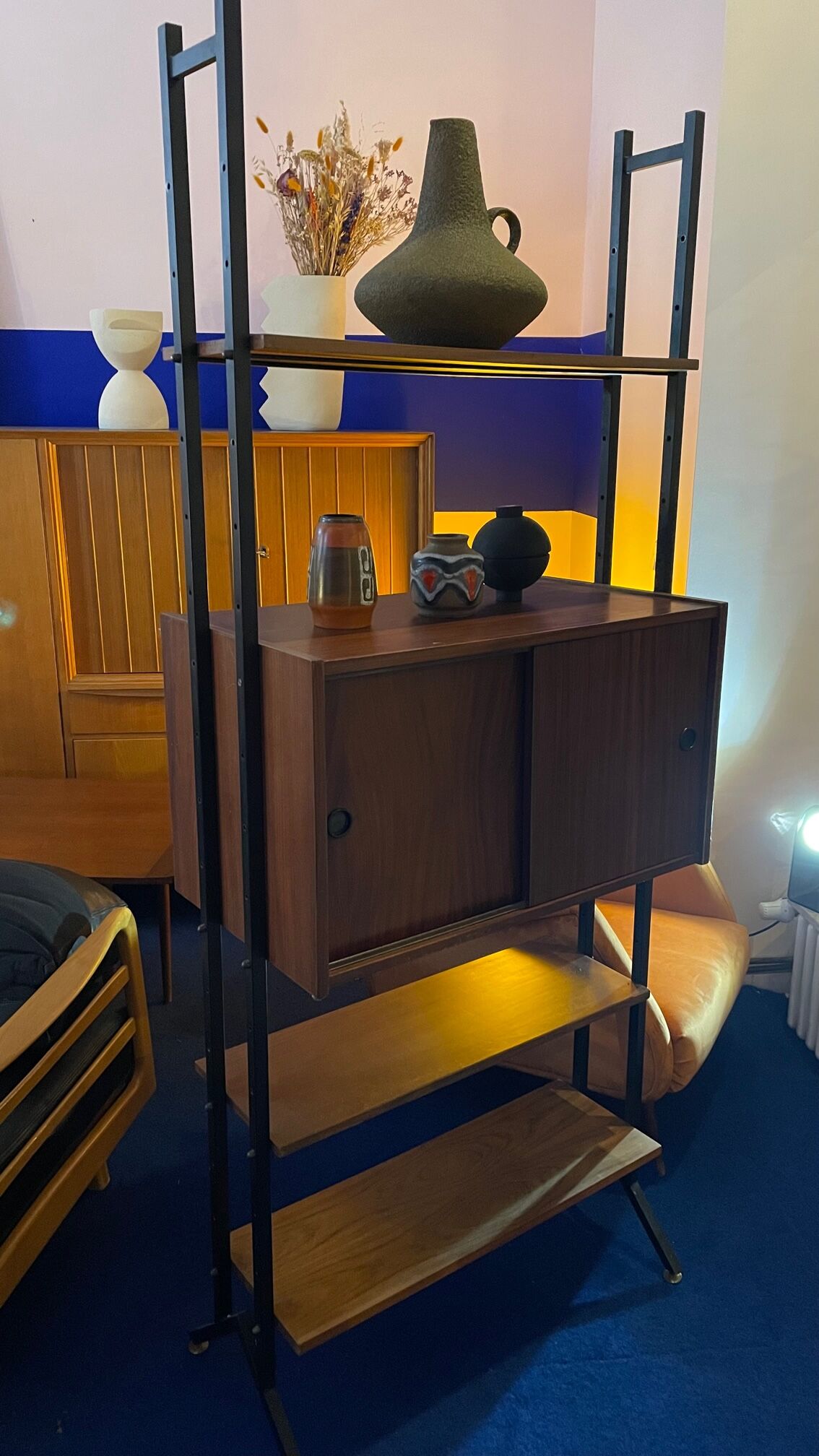 Italian footcase bookcase from the 60s in teak and metal