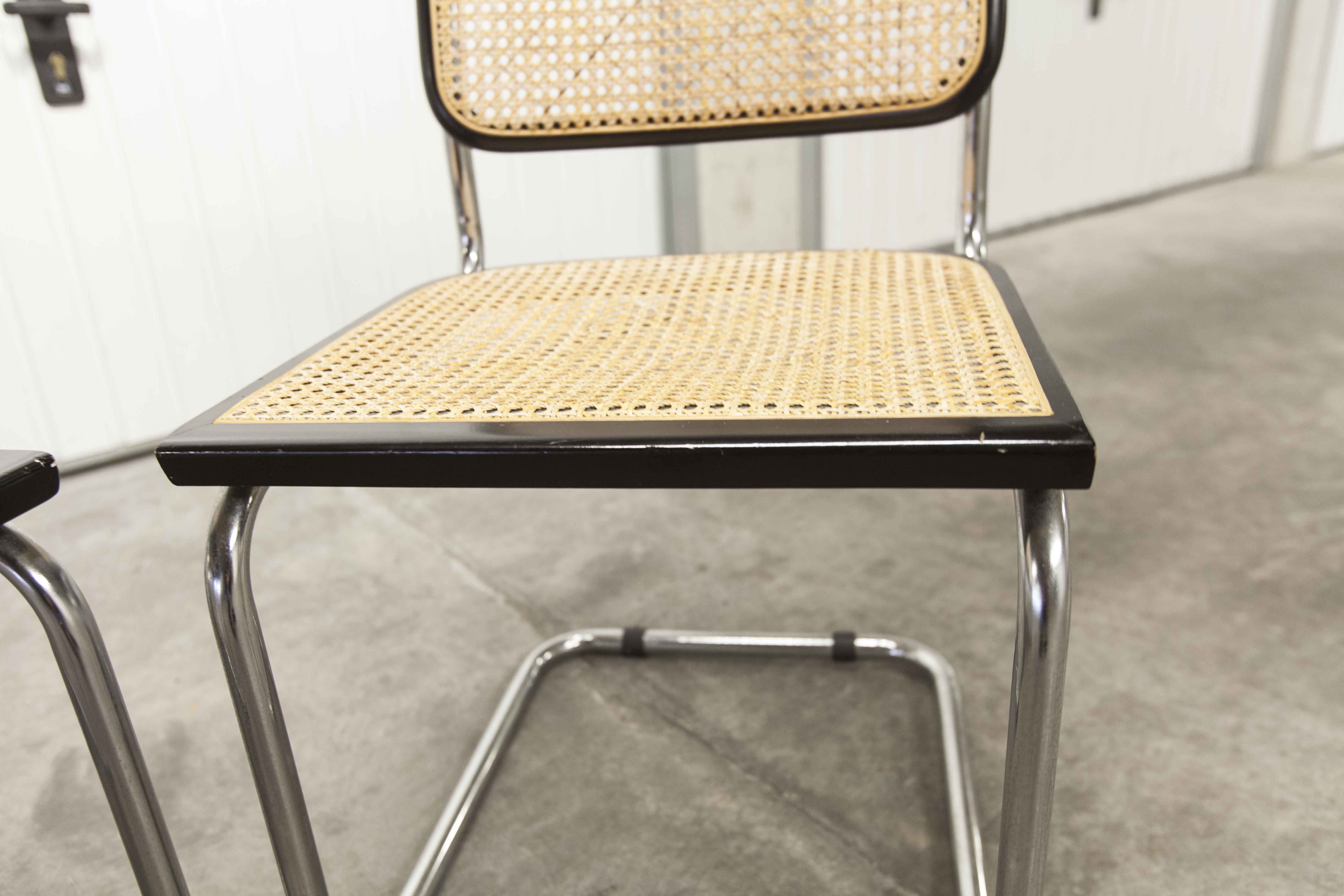 Pair of black Breuer b32 chairs and cannage