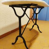 Oval carrara marble table (fixed) and two cast iron chairs