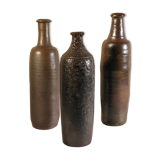 Lot de trois bouteilles anciennes en grès