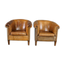 Set of 2 club chairs in patinated sheepskin