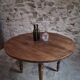 French antique round dining table in walnut, circa 1880–1900.