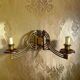 Art Nouveau style brass double piano wall lamp