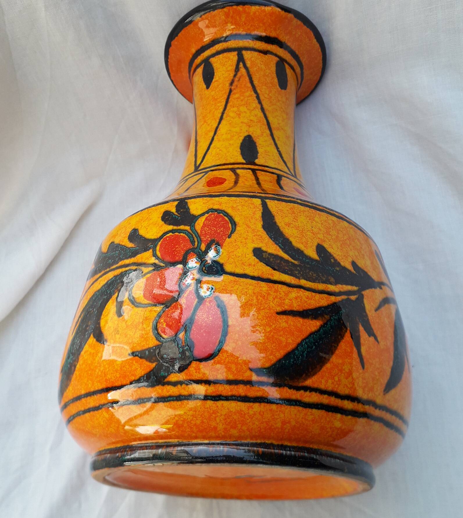 Orange ceramic pitcher from Italy