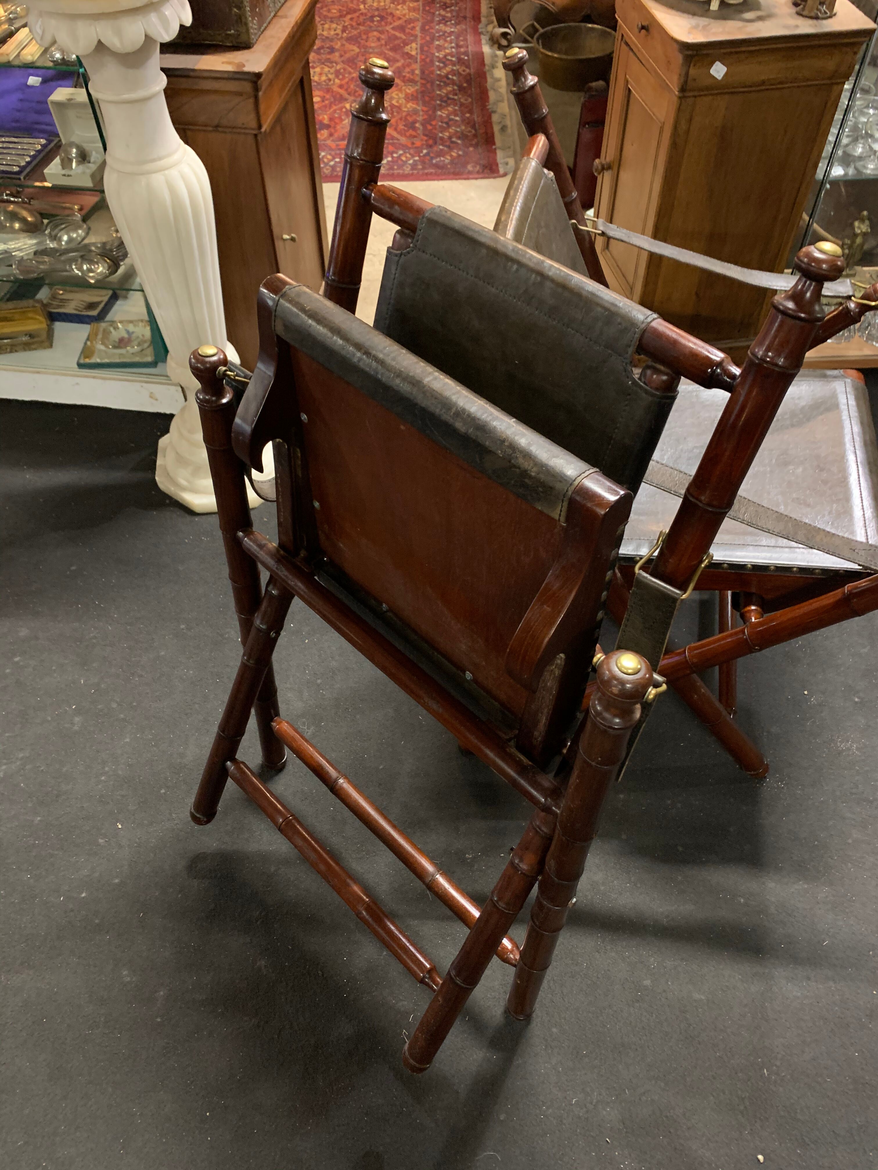 Pair of mahogany colonial armchairs