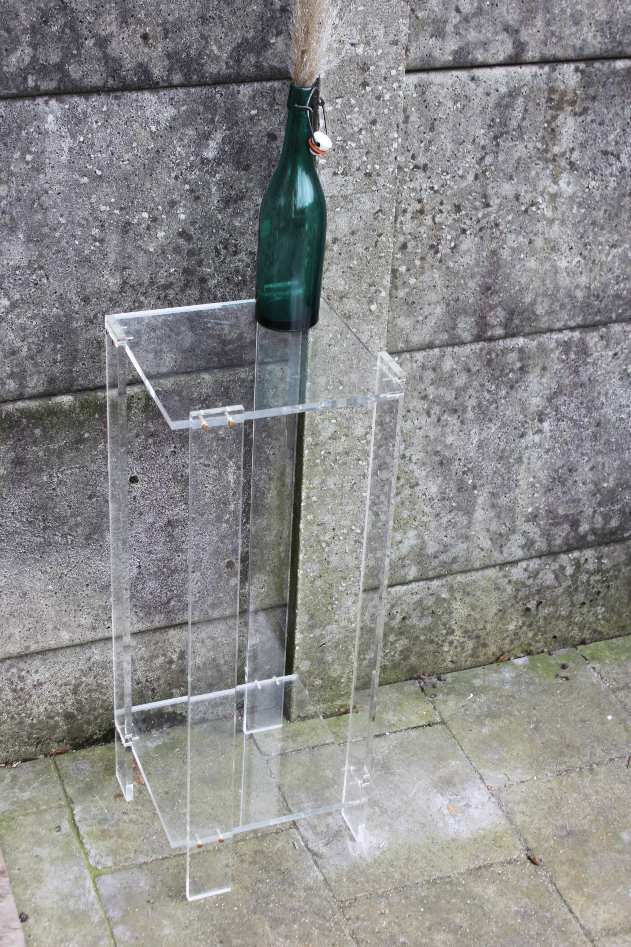 Tall lucite sidetable, 1970s.