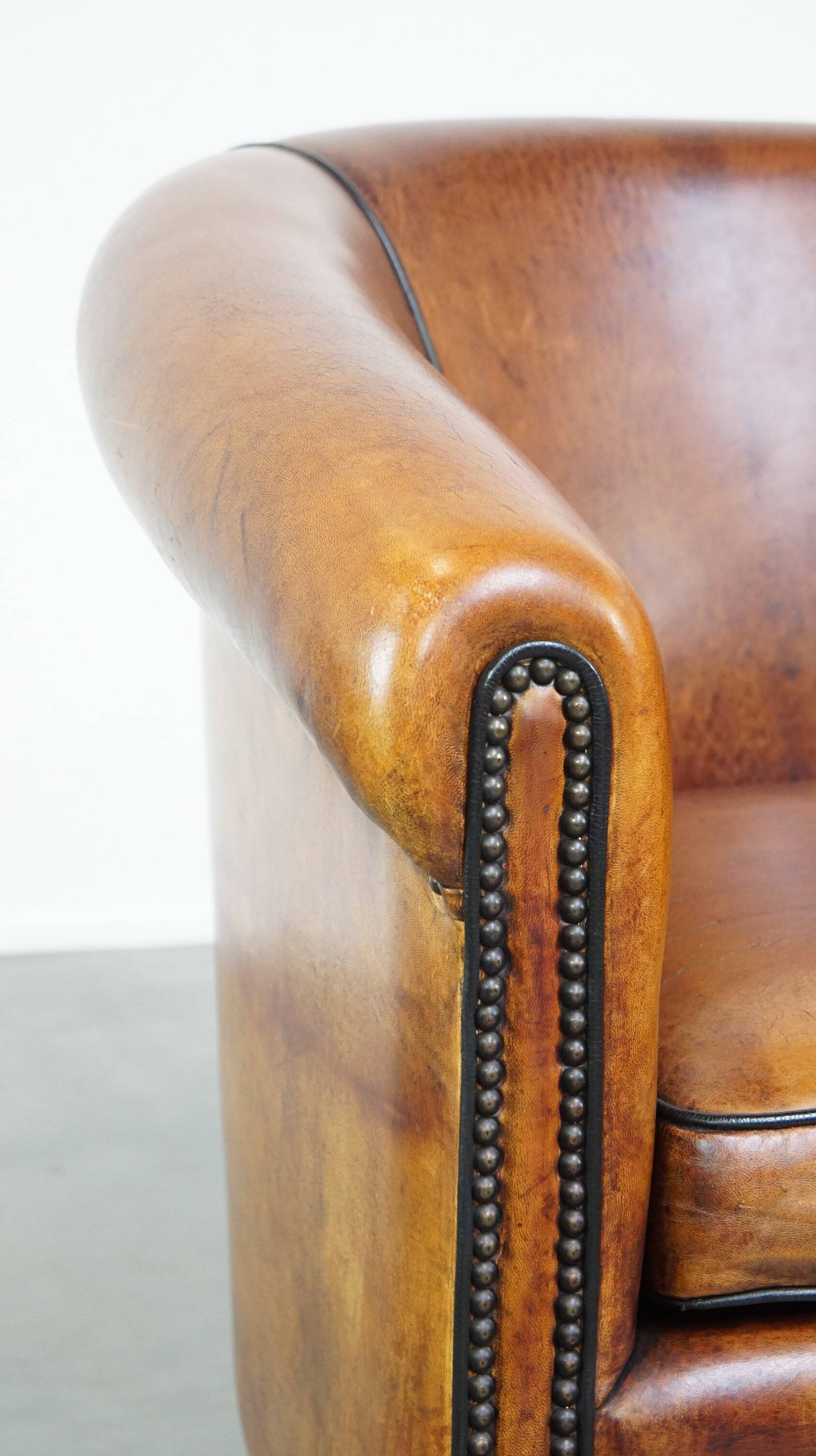 Fauteuil club vintage en cuir de mouton