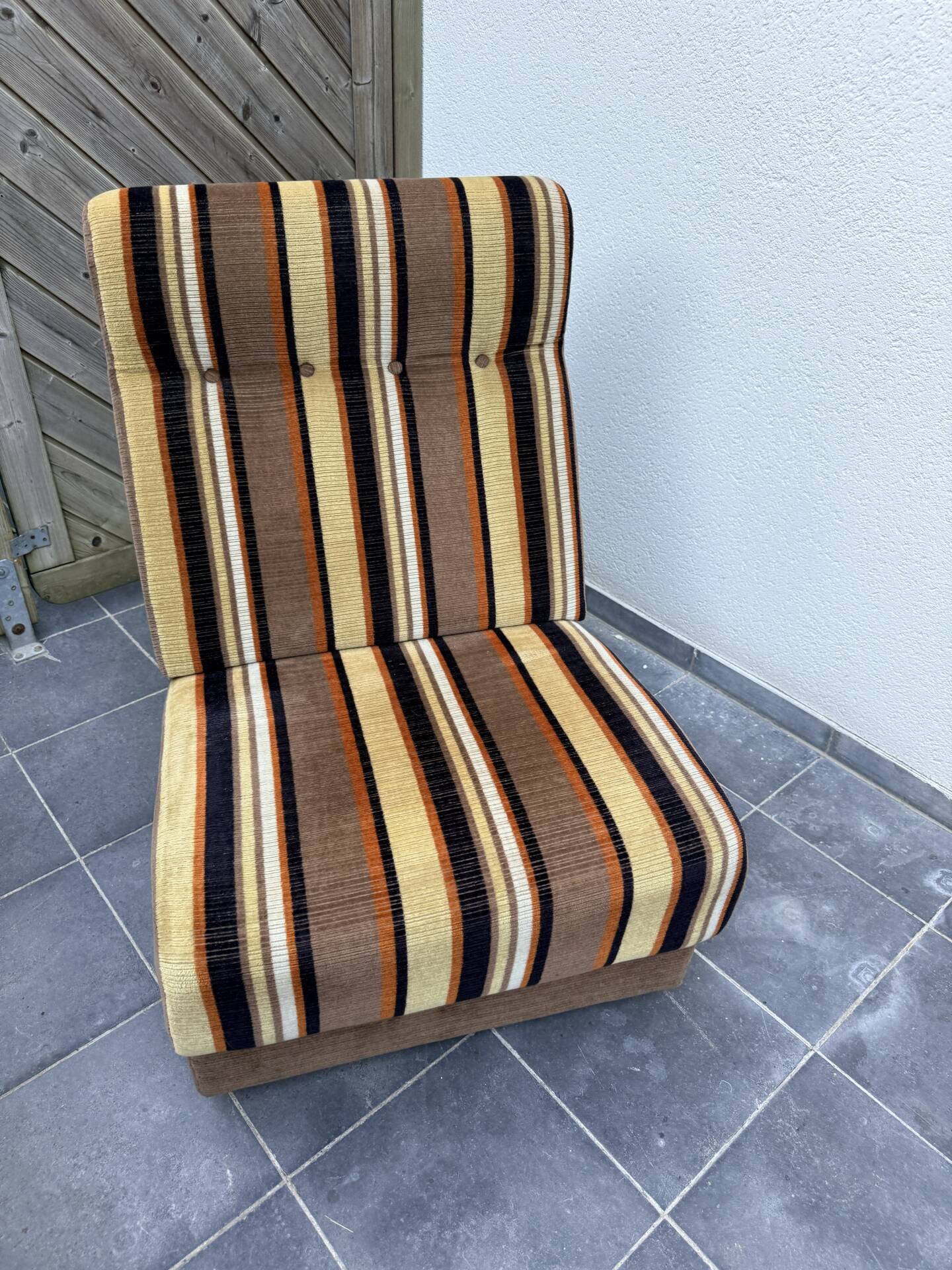 Vintage 1970s lounge chair – striped orange, brown, and cream velvet