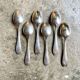 6 silver metal spoons