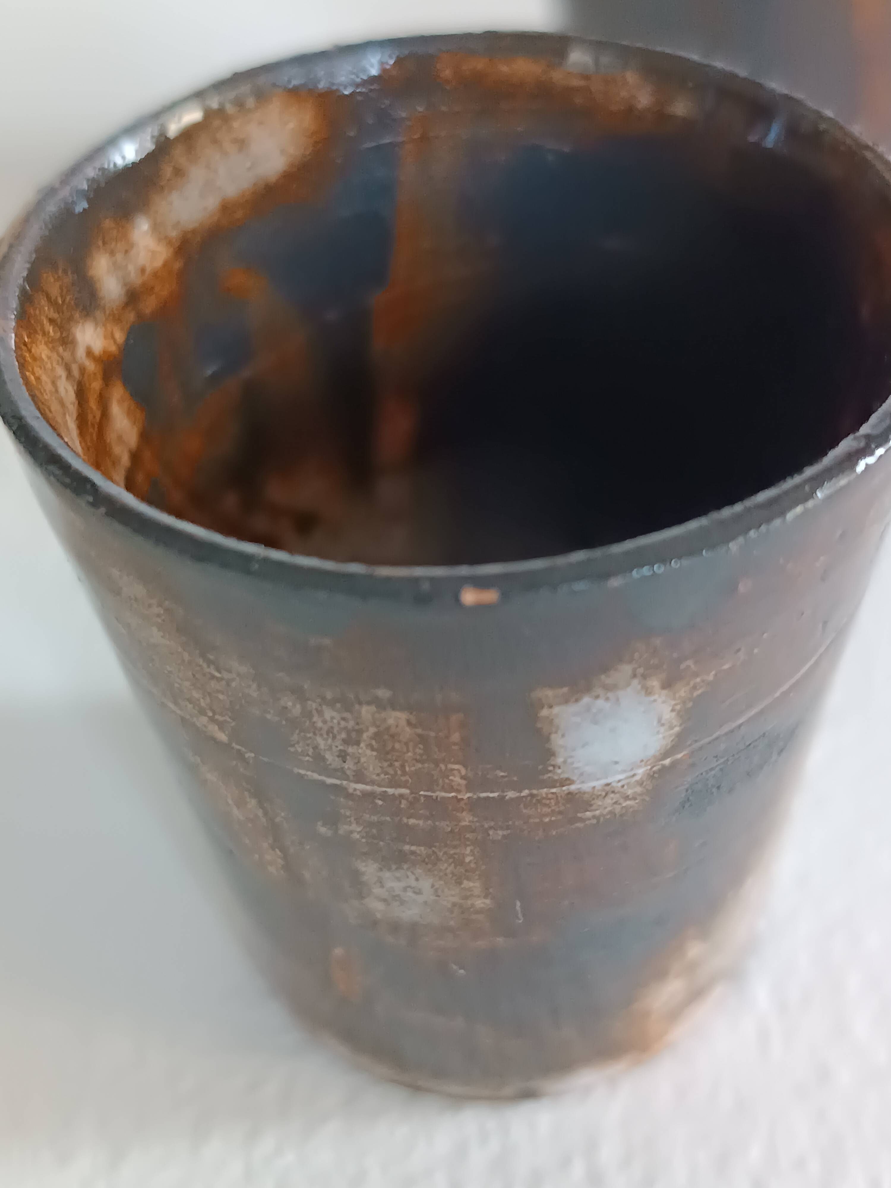 A bottle and six ceramic cups by Gérard Hofmann Vallauris 1950.