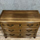 Curved Louis XV style chest of drawers in solid wood with a light patina