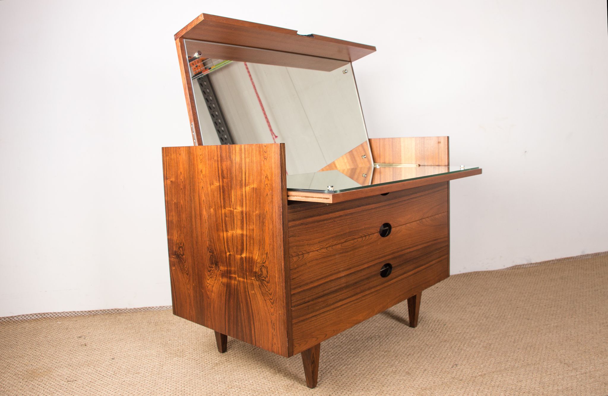 Rosewood chest of drawers designed by Paul Geoffroy published by Roche Bobois.