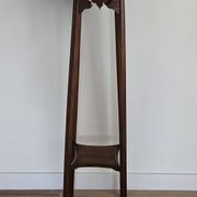 High plant stand in carved wood and Art Nouveau marble.