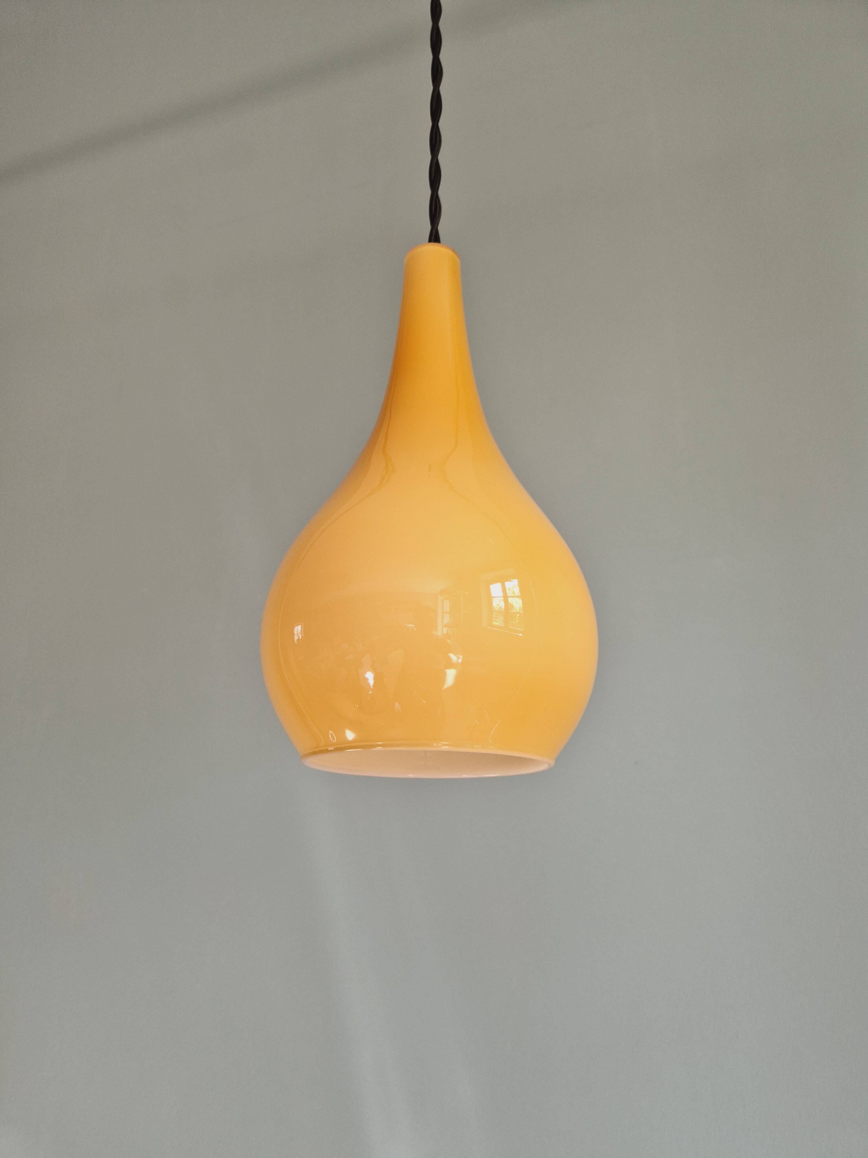 Scandinavian pendant light in honey-colored opaline glass, 1960s