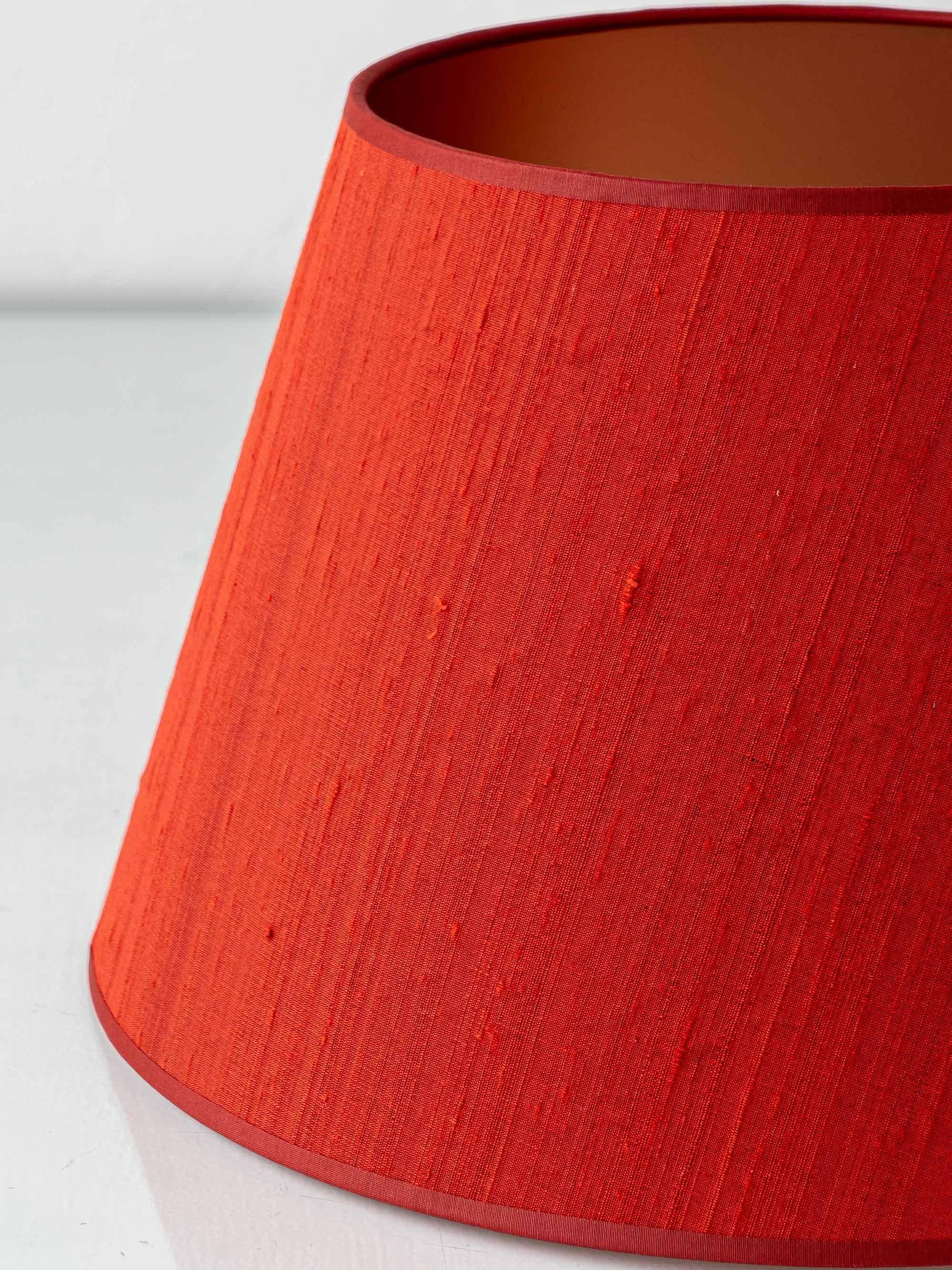 Pair of Royal Delft blue and white ceramic table lamps with new vermilion silk shades.