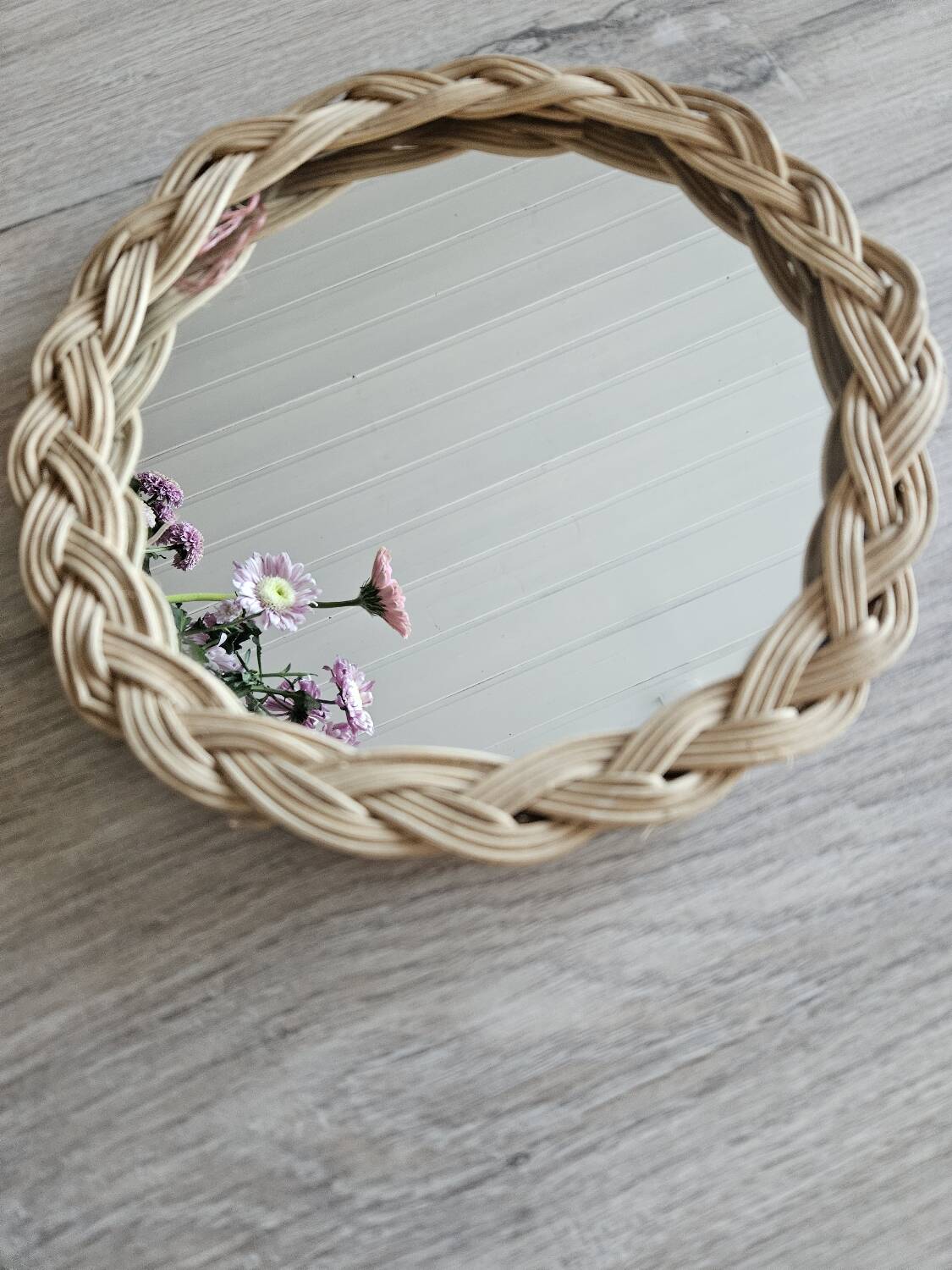 Old small round wicker mirror