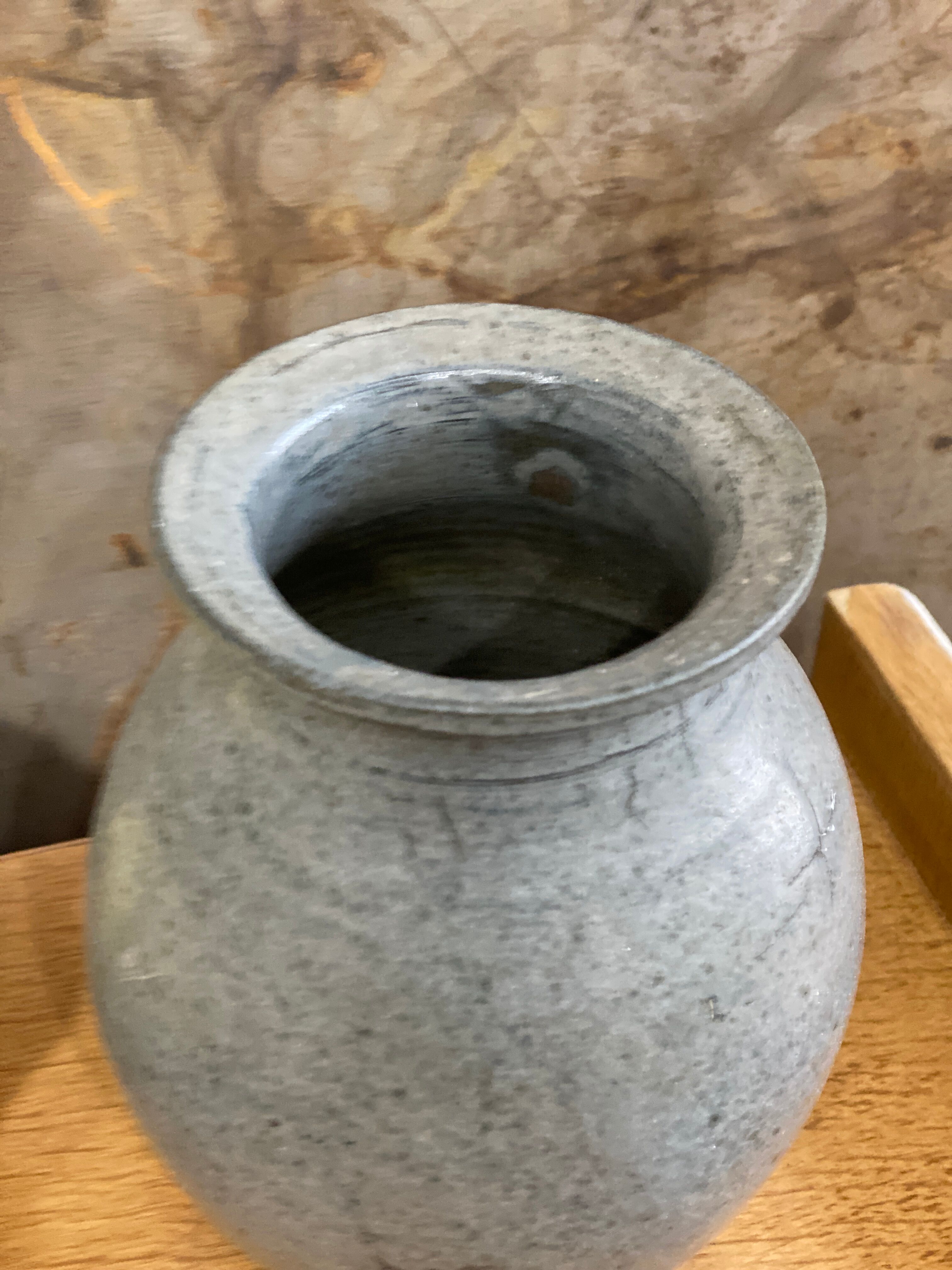 Old bluish grey ceramic vase