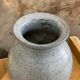 Old bluish grey ceramic vase