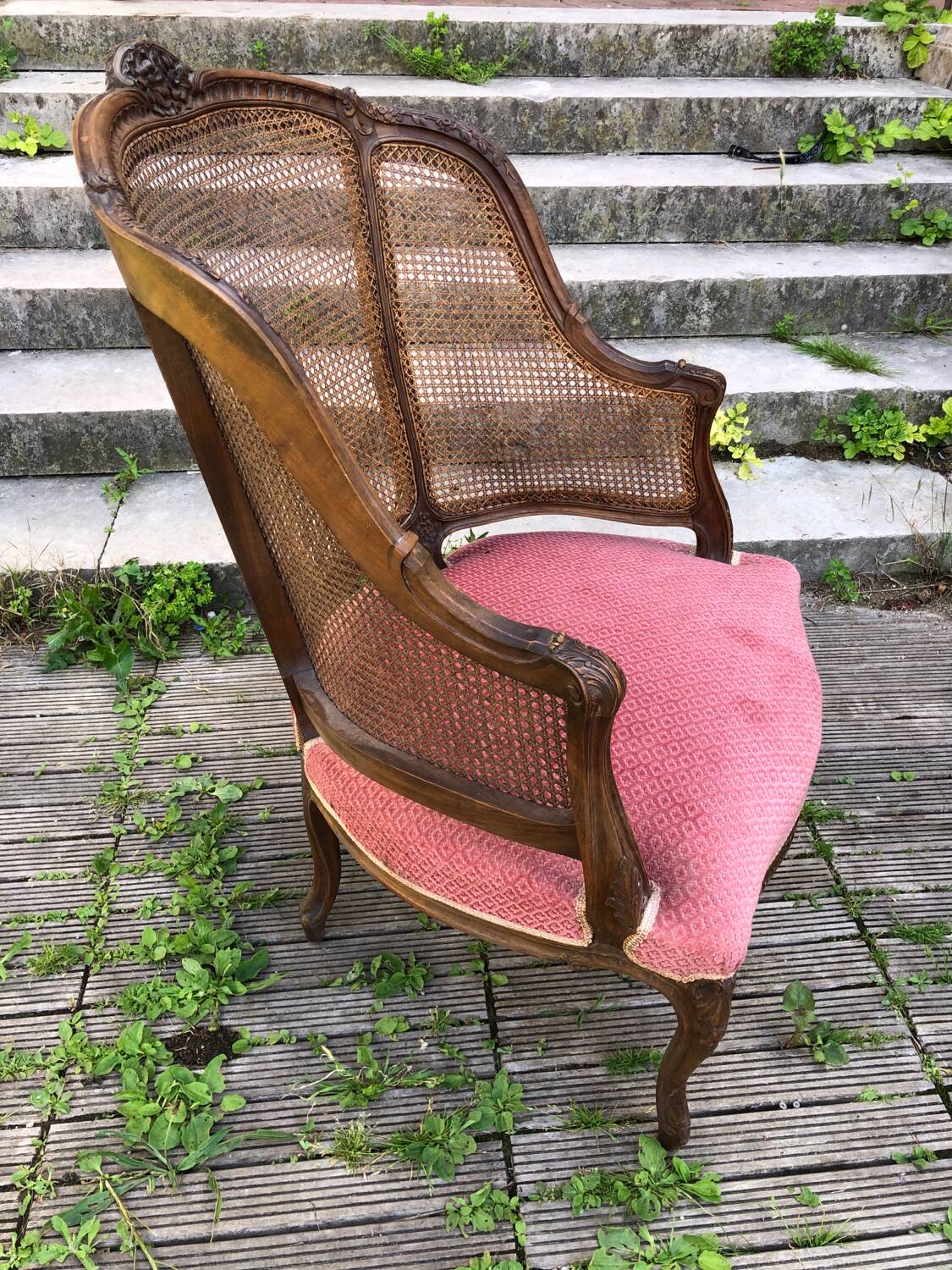 Louis XV style walnut and cane armchair