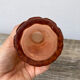 Art Deco perfume bottle in old amber pink glass
