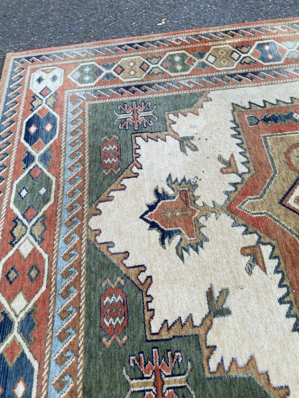 Large oriental wool rug with terracotta geometric patterns 200x300cm