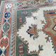 Large oriental wool rug with terracotta geometric patterns 200x300cm
