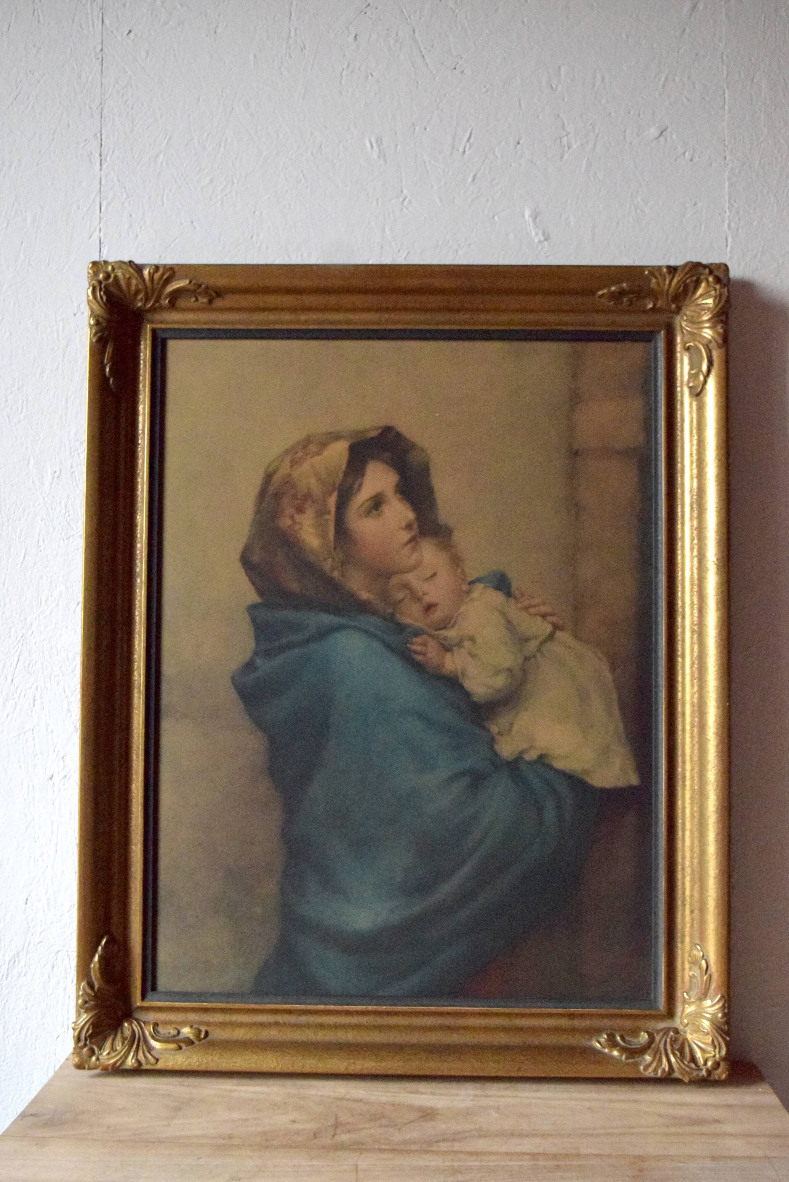 Old large wall frame in gilded carved wood