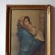 Old large wall frame in gilded carved wood