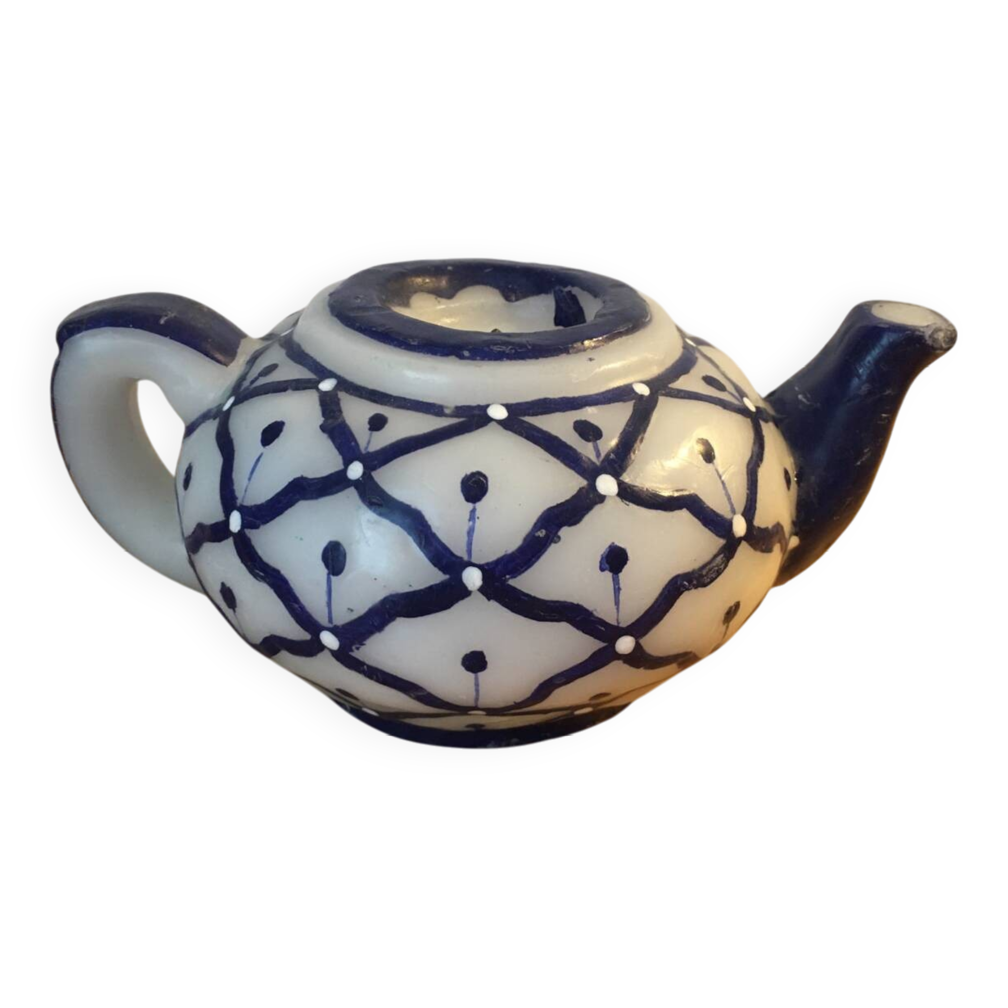 Vintage teapot shaped candle.