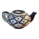 Vintage teapot shaped candle.