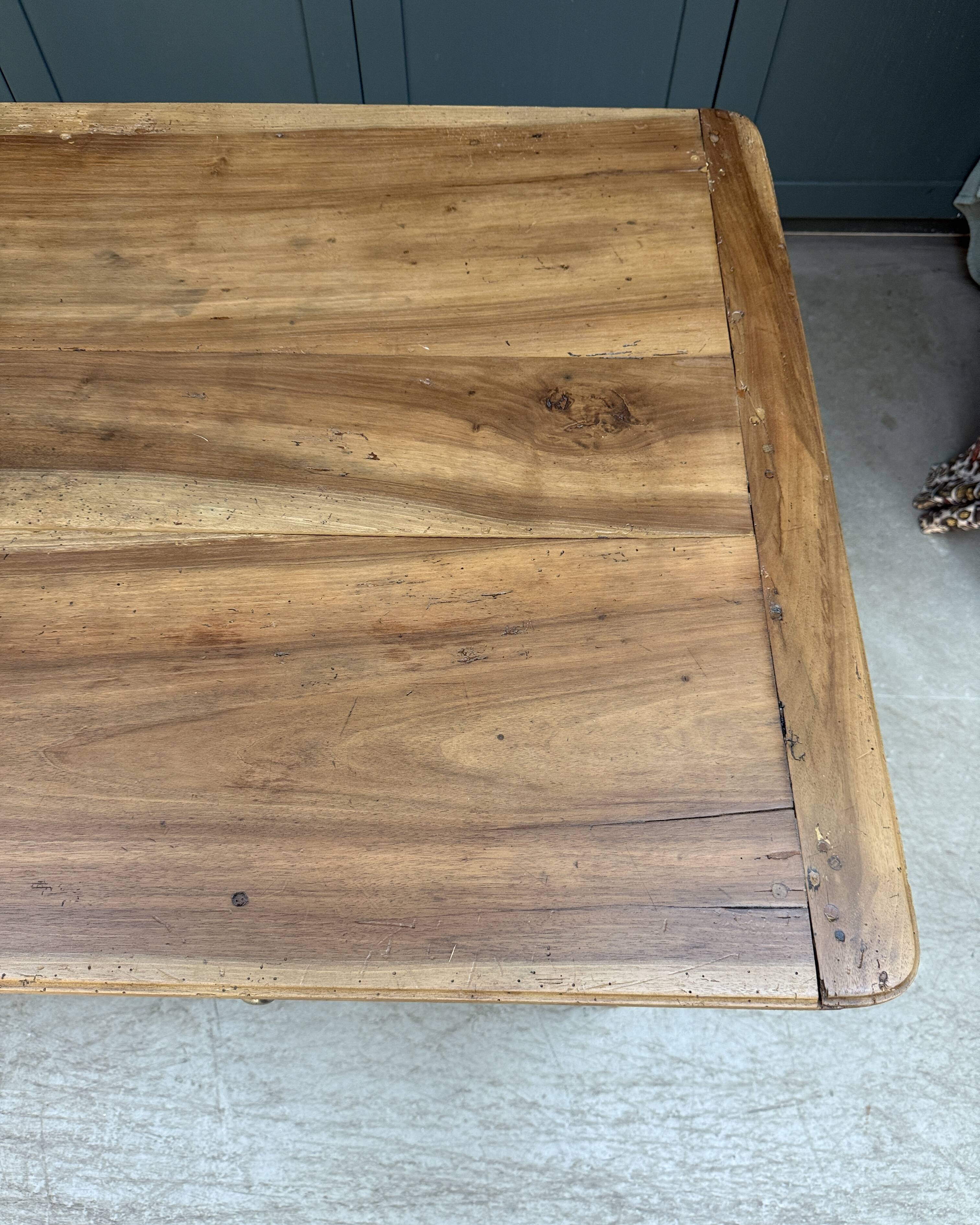 Renovated oak and walnut farmhouse table.
